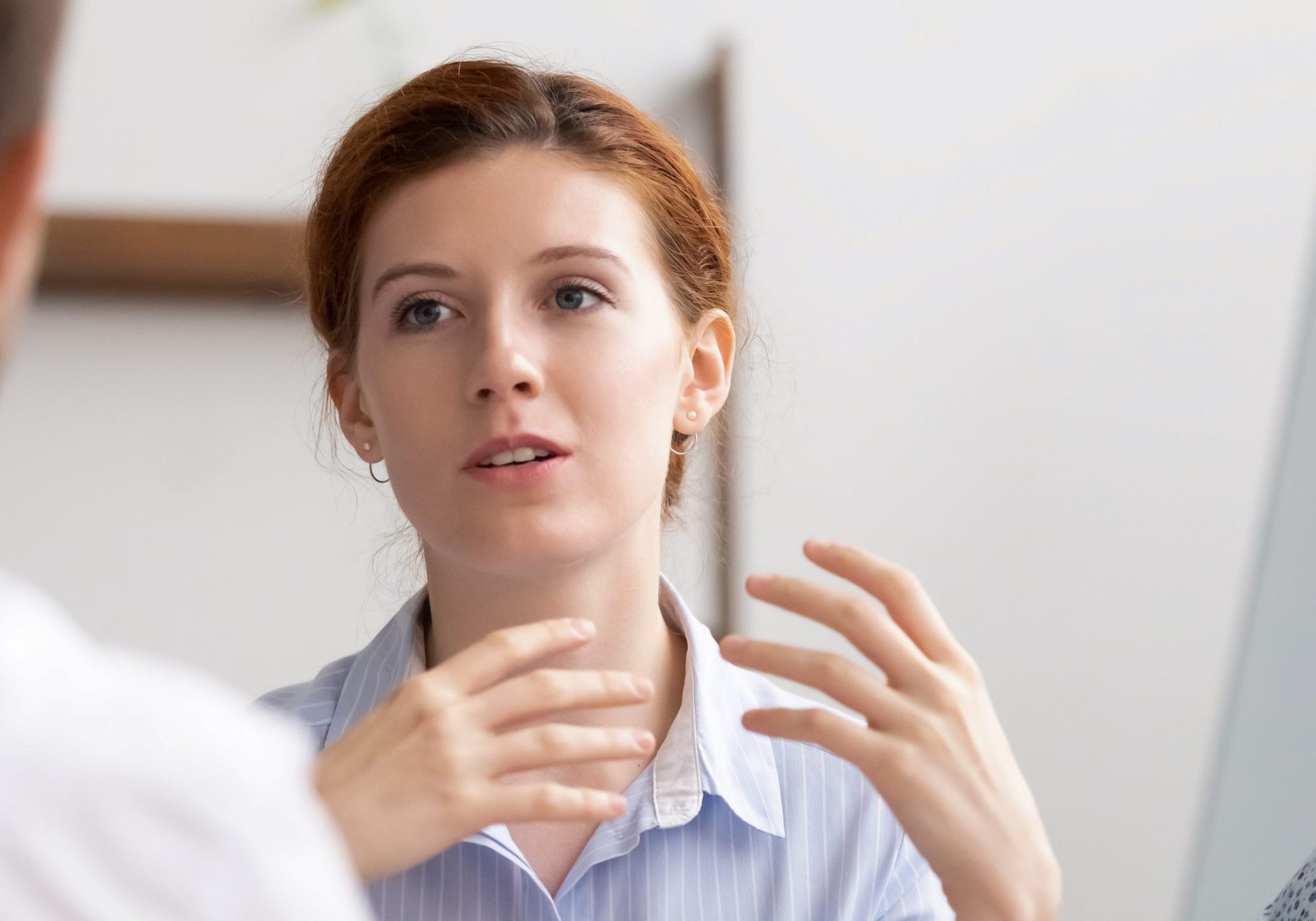 Head shot confident businesswoman, senior teacher mentor, coacher speaking Head shot confident businesswoman, senior teacher mentor, coacher speaking to business people. Female speaker making offer, giving advice, teaching interns, sharing project idea, brainstorming